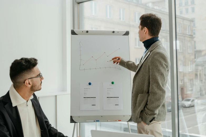 a man giving a presentation to a group of people, trending on pexels, analytical art, two men, on white paper, 🦩🪐🐞👩🏻🦳, professional model