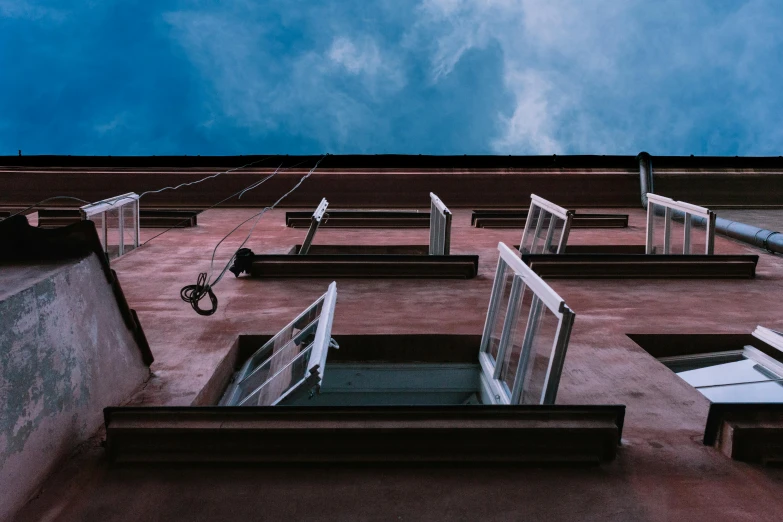 there is no image here to provide a caption for, by Adam Marczyński, pexels contest winner, surrealism, wires hanging across windows, ten flats, view from ground level, unsplash 4k