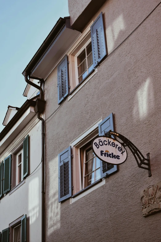 a sign that is on the side of a building, inspired by Jan Kupecký, delightful surroundings, the backrooms, flickering, photo for a store