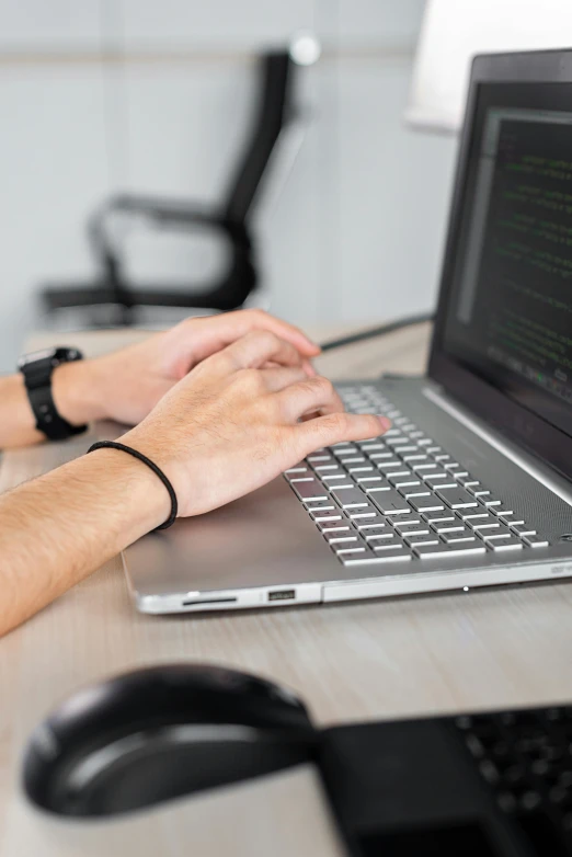 a close up of a person typing on a laptop, a computer rendering, pexels, a python programmer's despair, sitting with wrists together, circuitry, over the shoulder