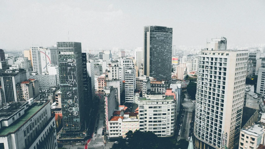 a view of a city from the top of a building, high rise buildings, lo fi, surrounding the city, background image