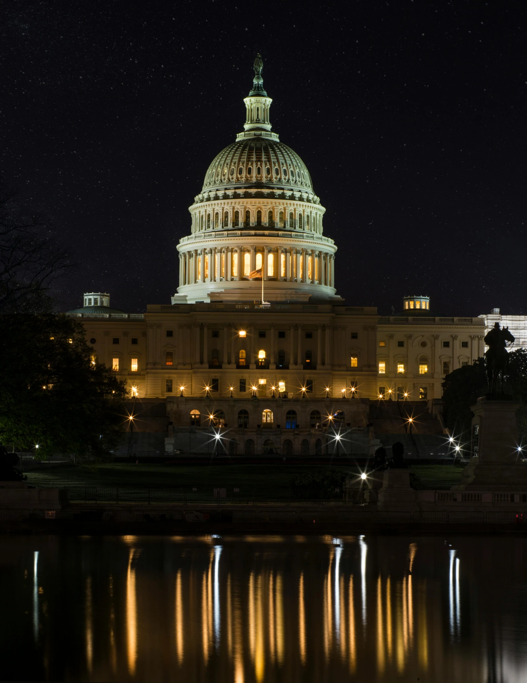 the capitol building is lit up at night, a picture, unsplash contest winner, renaissance, transgender, background image, 2 0 1 0 photo, pelosi