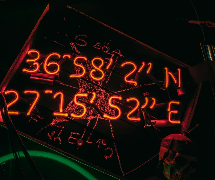 a neon sign hanging from the side of a building, glowing digital runes, latitude and longitude, in a darkly lit laboratory room, lasers for lights