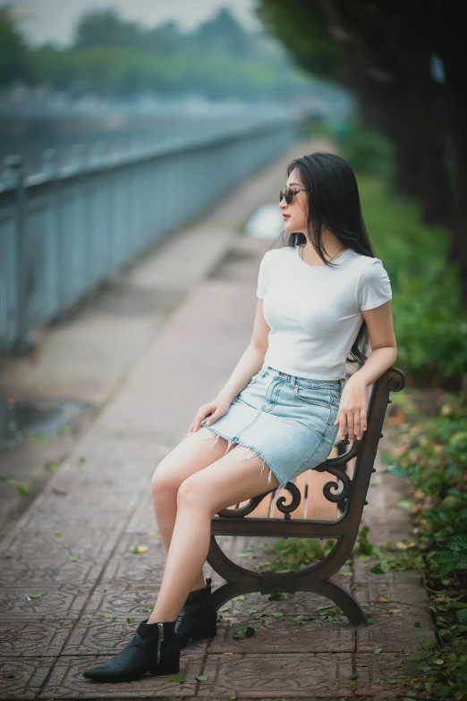 a woman sitting on top of a wooden bench, by Leng Mei, pexels contest winner, realism, full body cute young lady, dressed in a white t-shirt, 🤤 girl portrait, dang my linh