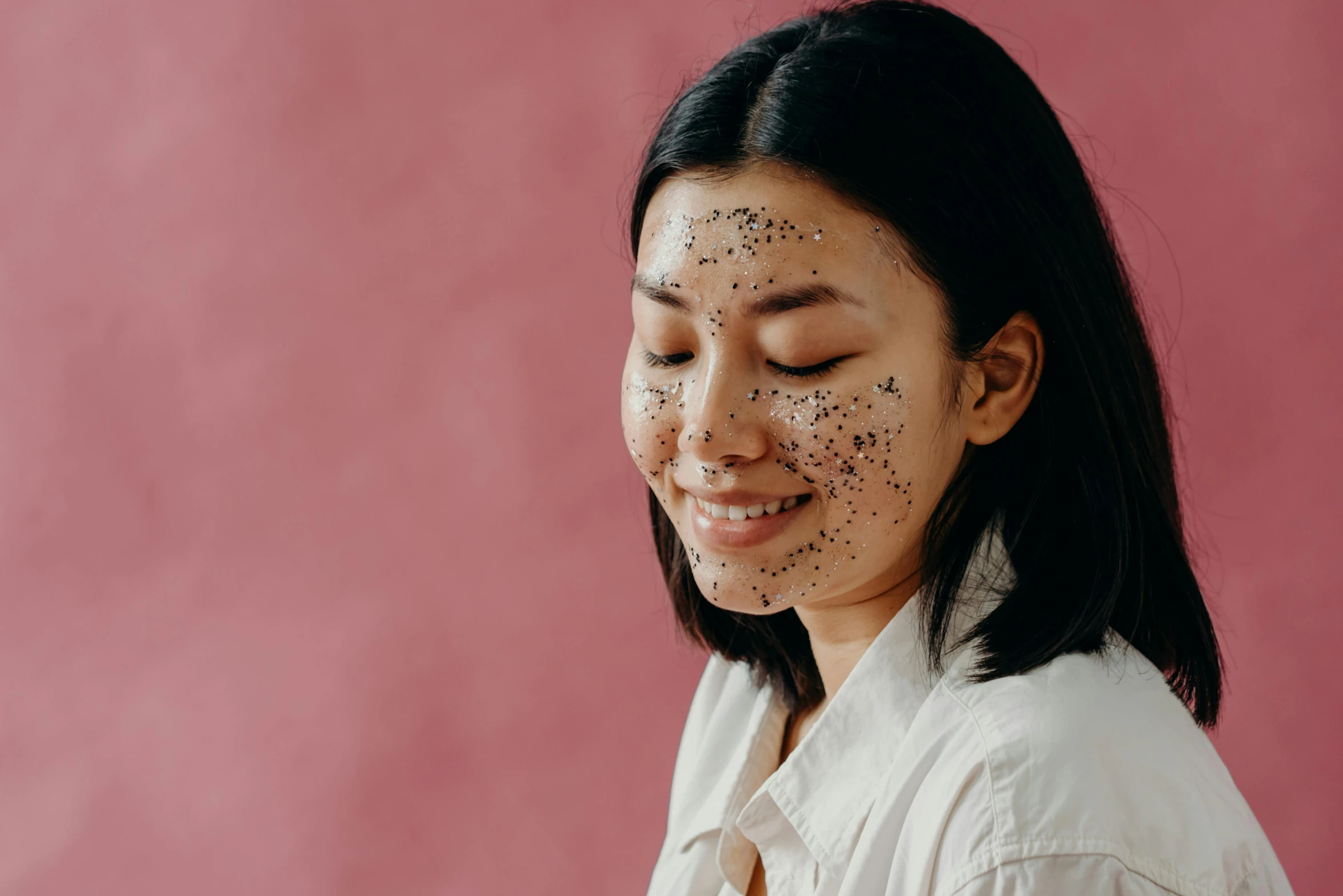 a close up of a woman with freckles on her face, a stipple, trending on pexels, mingei, black facemask, having a good time, asian female, full body image