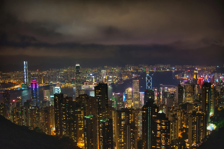 a view of a city at night from the top of a mountain, pexels contest winner, hong kong buildings, panoramic, fan favorite, gigapixel photo