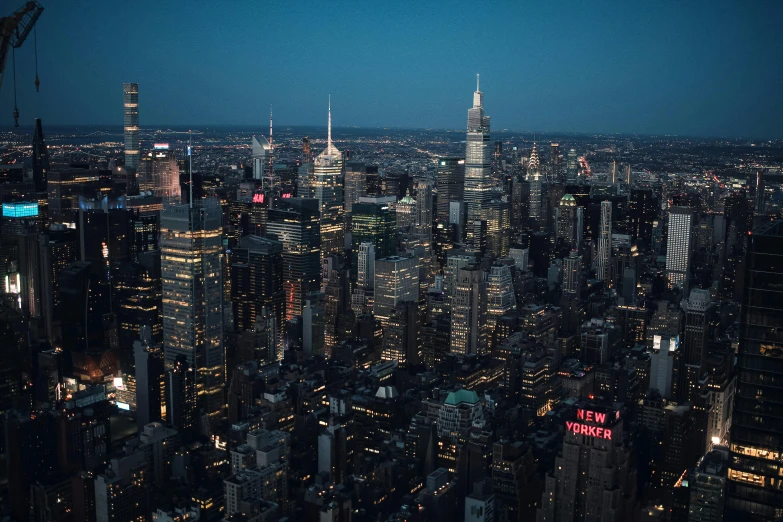 a view of a city at night from the top of a building, new york buildings, high res 8k, instagram post, fashionable