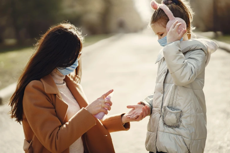 a woman and a child wearing face masks, by Emma Andijewska, trending on pexels, reaching out to each other, scolding, brown, 15081959 21121991 01012000 4k