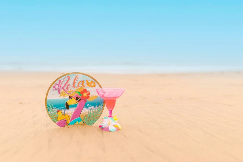 a pin sitting on top of a sandy beach, a picture, glassware, pink and yellow, flamingo, multicoloured