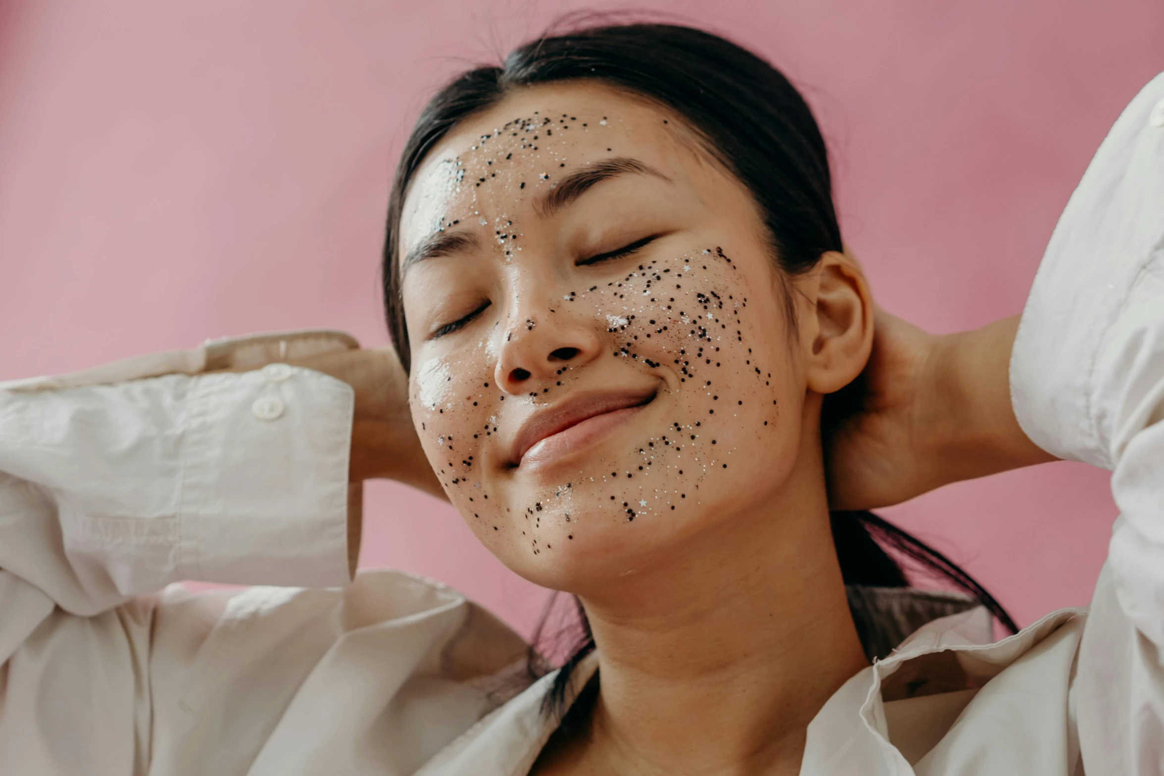 a woman with black spots on her face, a stipple, trending on pexels, mingei, having a good time, manuka, body and face, starry