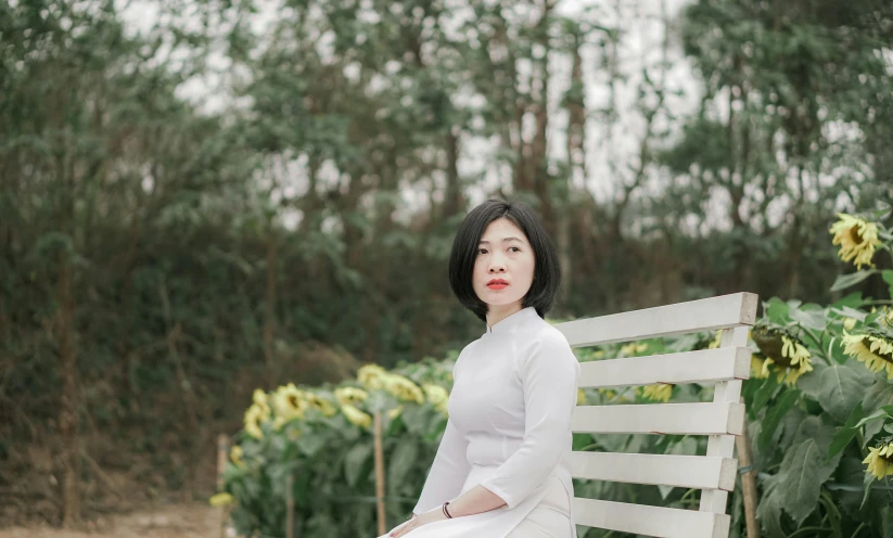 a woman in a white dress sitting on a white bench, inspired by Ruth Jên, pexels contest winner, vietnamese woman, avatar image, half body photo, high quality image