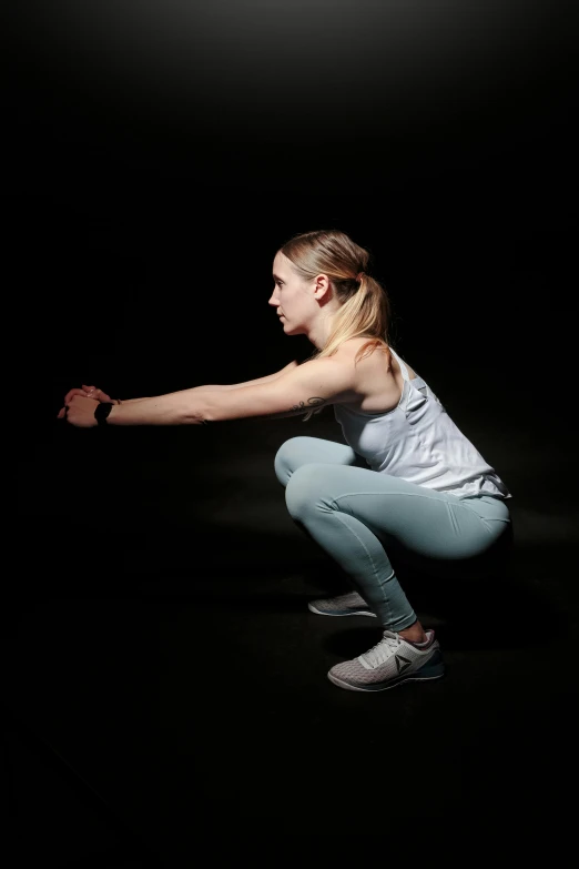 a woman squatting in the dark with a tennis racket, pexels contest winner, waist reaching ponytail, modified, 2263539546], a blond