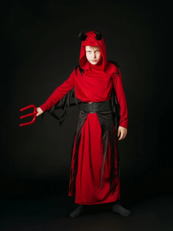 a little boy dressed in a devil costume, inspired by Robert Walker Macbeth, reddit, shin hanga, ariana grande as a sith, photograph taken in 2 0 2 0, teenager, high resolution print :1 red