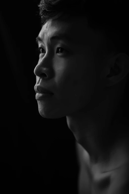 a black and white photo of a man, a black and white photo, inspired by Wang Ximeng, pexels contest winner, hyperrealism, thin young male, profile picture 1024px, keng lye, light from right