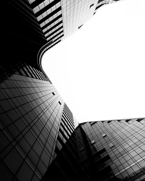 a black and white photo of tall buildings, by Matthias Weischer, full of glass. cgsociety, curved lines, view from ground, shinjuku