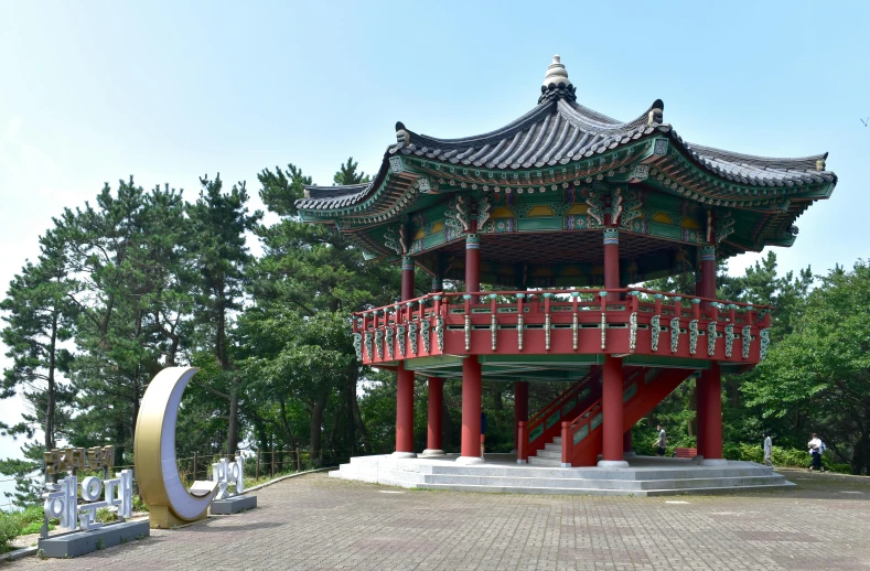 a pagoda sitting in the middle of a park, inspired by Byeon Sang-byeok, unsplash, cloisonnism, square, sportspalast amphitheatre, seaview, 8 k )