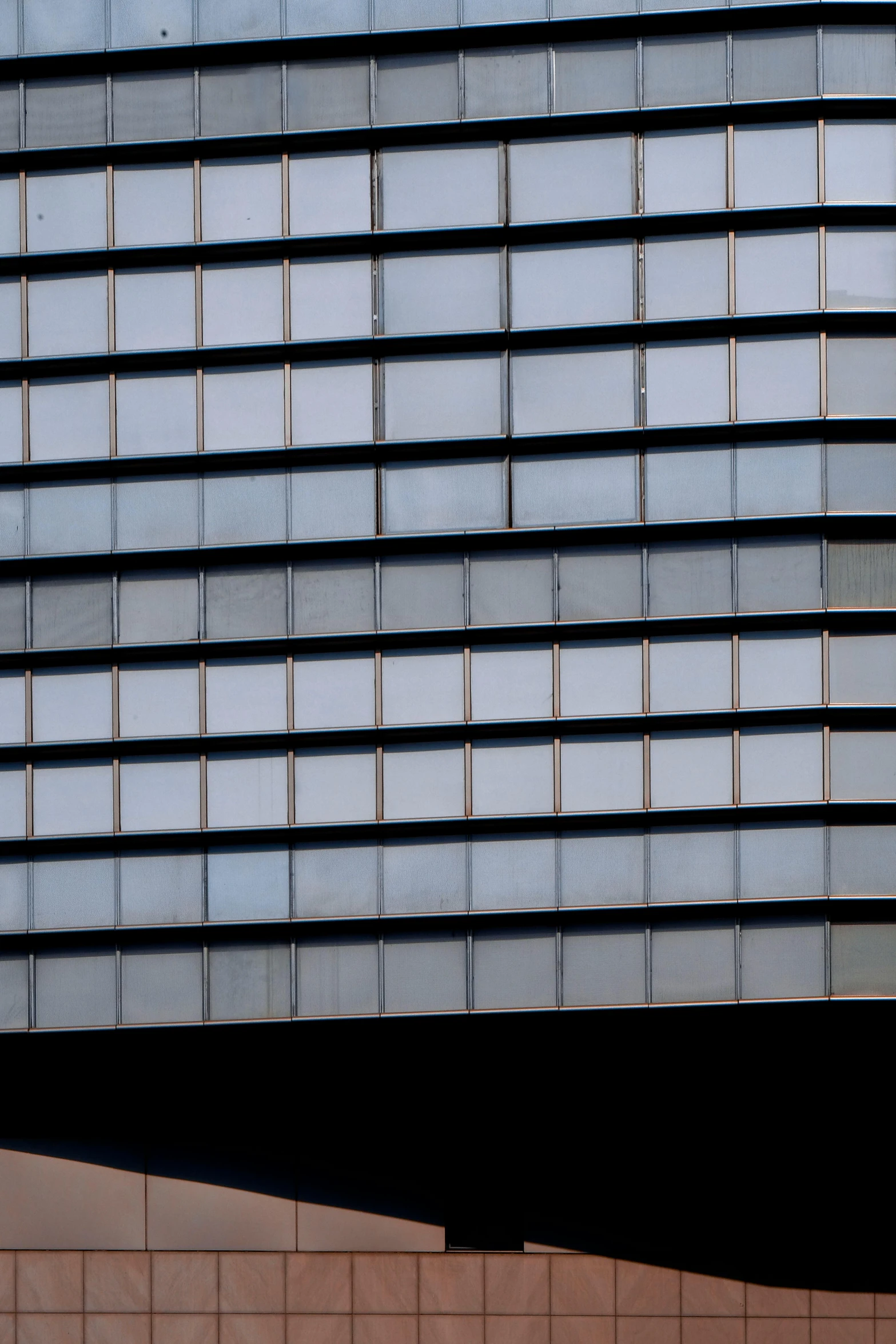 a clock that is on the side of a building, an album cover, inspired by Andreas Gursky, flickr, panorama, glass texture, 50 shades, madrid