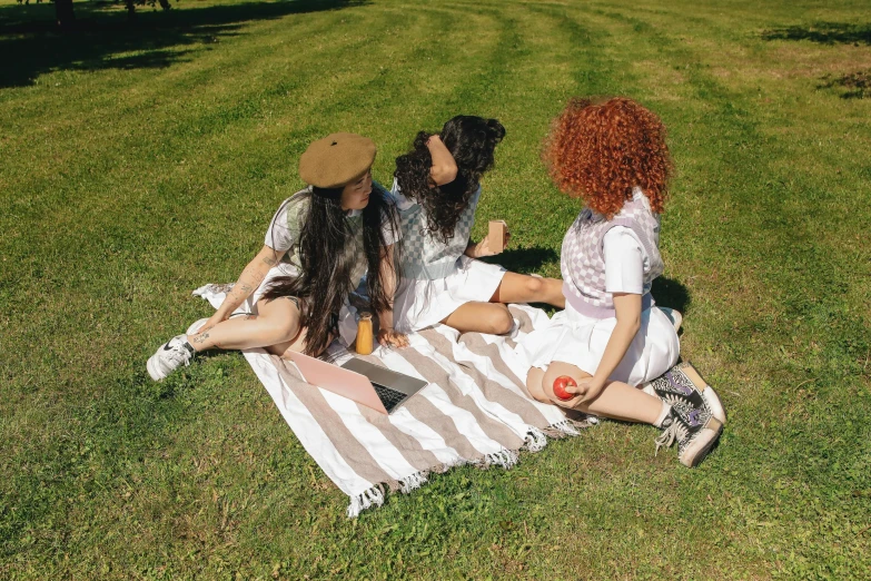 a group of women sitting on top of a lush green field, an album cover, by Julia Pishtar, pexels contest winner, people on a picnic, striped, 15081959 21121991 01012000 4k, flirting