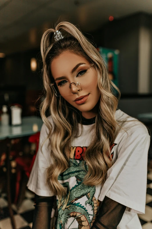 a woman sitting on top of a black and white checkered floor, an album cover, by Robbie Trevino, trending on pexels, flowy golden hair, silver hair (ponytail), katelynn mini cute style, headshot profile picture