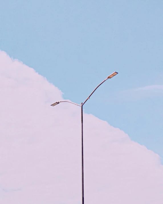 a street light sitting on top of a snow covered hill, an album cover, by Carey Morris, unsplash, postminimalism, fluffy pastel clouds, profile image, iv pole, bright thin wires