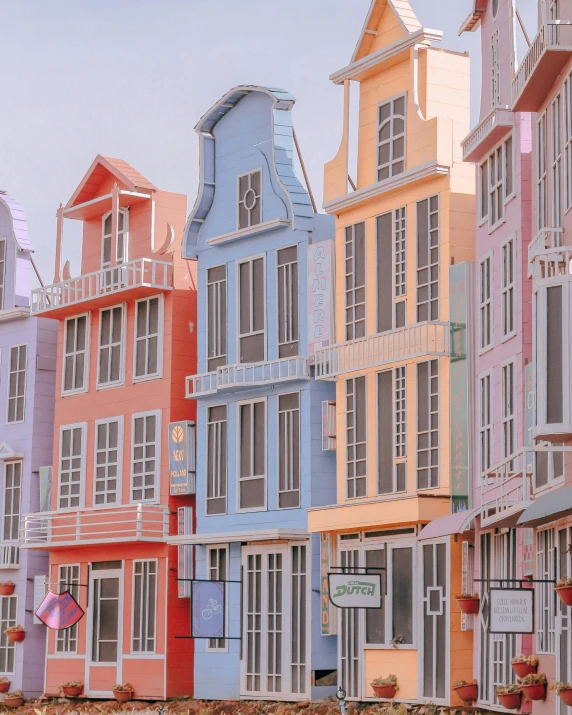 a row of colorful buildings next to a body of water, a colorized photo, inspired by Wes Anderson, pexels contest winner, art nouveau, the netherlands, pastel rainbow, ultra realistic 8k octan photo, set on singaporean aesthetic