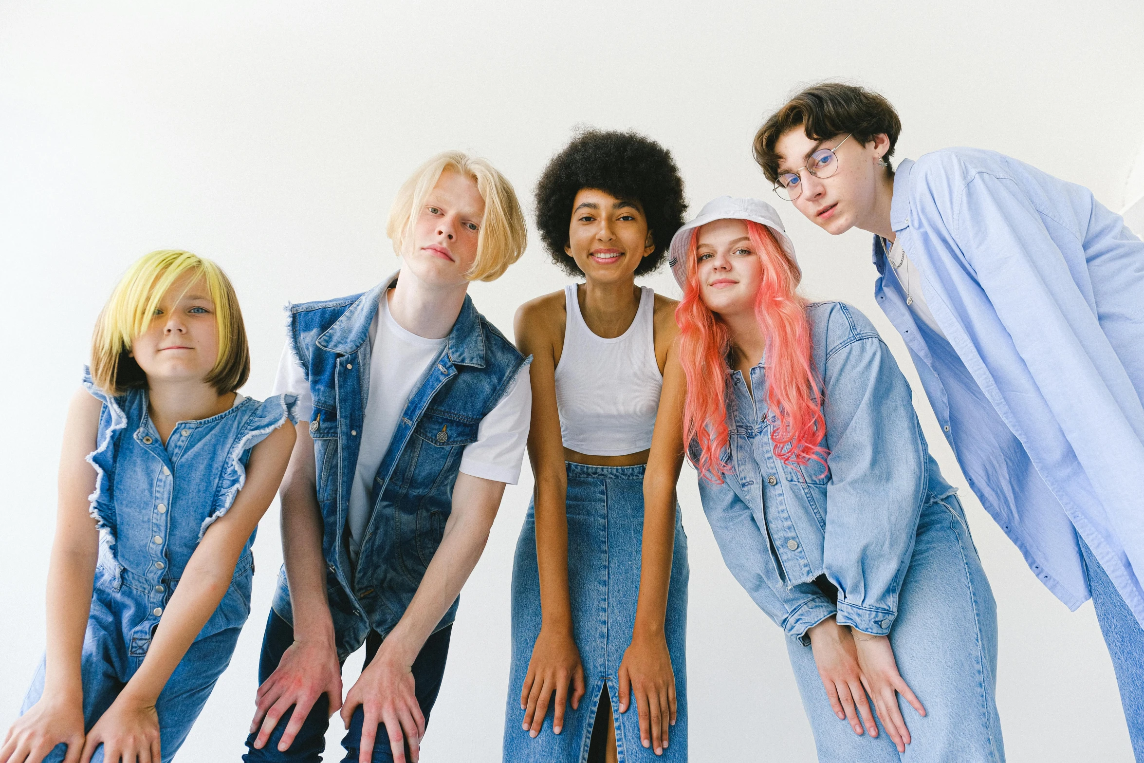 a group of young people standing next to each other, by Ellen Gallagher, trending on pexels, antipodeans, albino hair, denim, totally radical, rex orange county