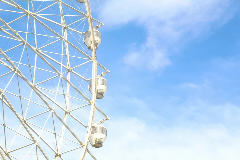 a ferris wheel against a blue sky with clouds, a portrait, pexels contest winner, surrealism, ariana grande photography, plain background, rule of three