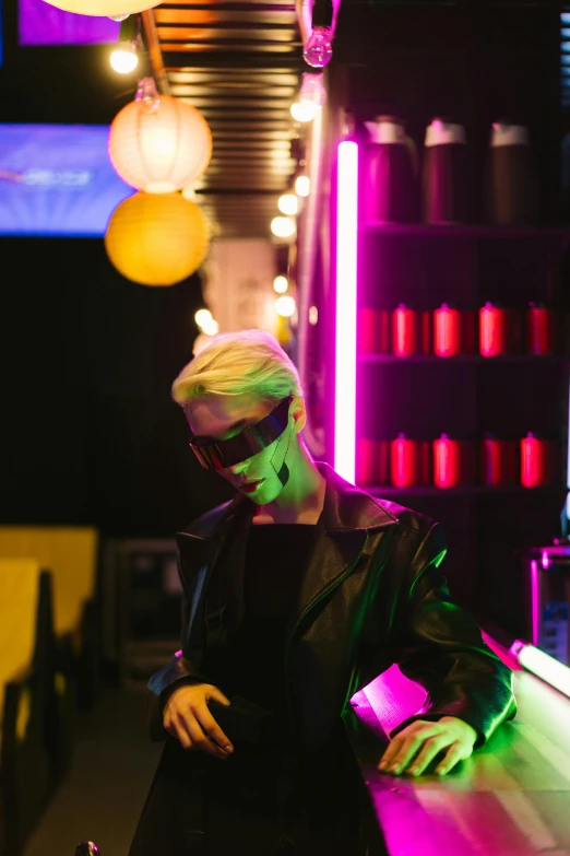 a man that is standing in front of a bar, trending on unsplash, interactive art, max headroom, unreal engine : : rave makeup, yellow lights, juice