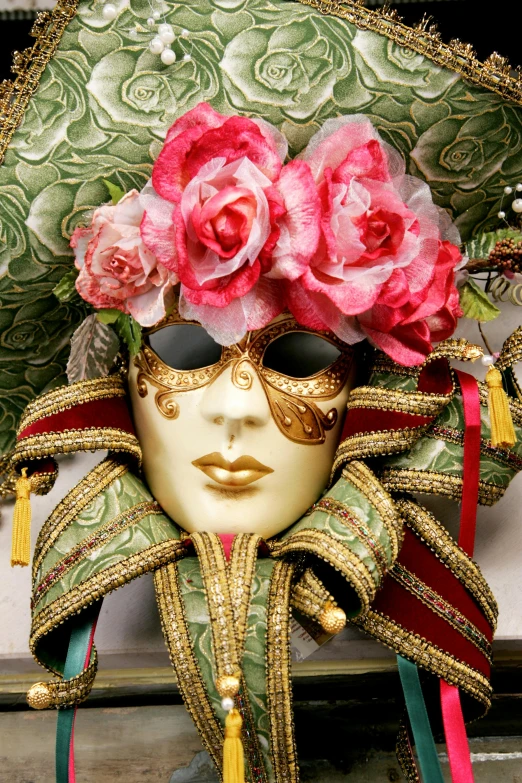 a close up of a mask with flowers on it, inspired by Gaetano Previati, slide show, ornately dressed, decorative roses, trending photo