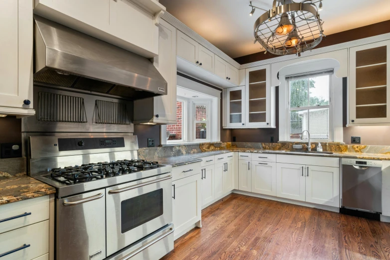 a kitchen with white cabinets and stainless steel appliances, featured on reddit, arts and crafts movement, profile image, fan favorite, flames, craftsman home