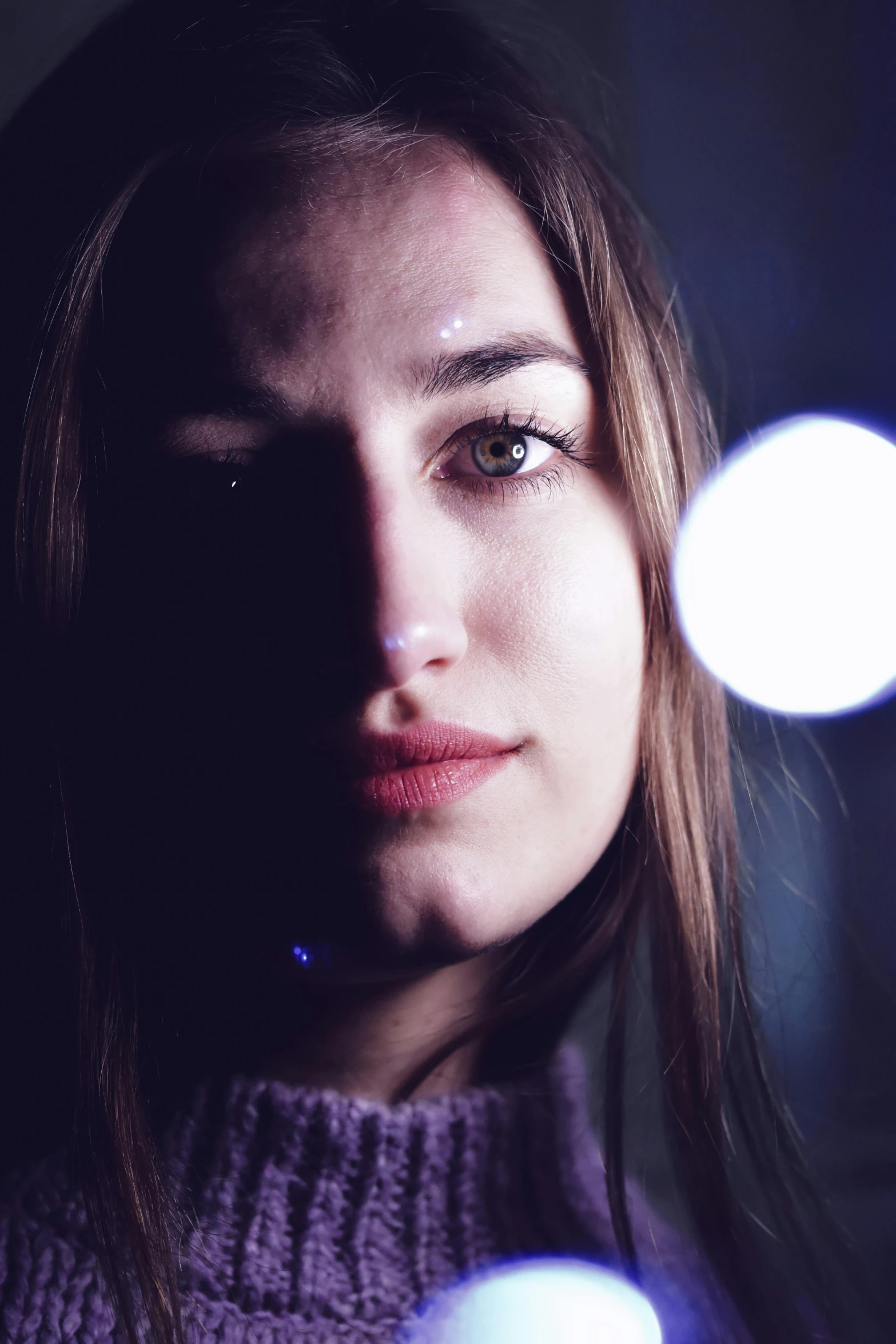 a close up of a person with lights in the background, a character portrait, inspired by Elsa Bleda, reddit, dramatic lighting hd quality, sad face, pokimane, lens flare photo real