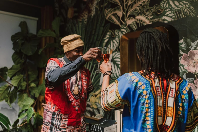 a man cutting another man's hair with scissors, pexels contest winner, afrofuturism, holding a glass of wine, patterned clothing, amen beats jungle party, wearing authentic attire