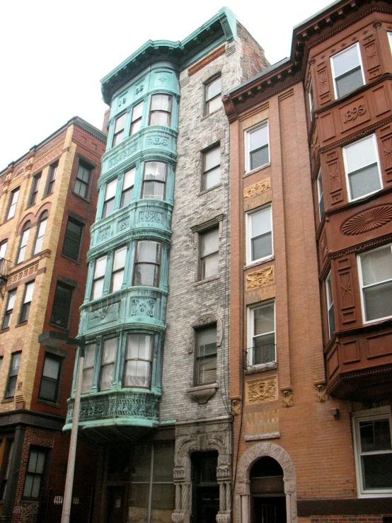 a couple of buildings that are next to each other, by Loren Munk, flickr, art nouveau, boston, brown and cyan color scheme, 2 5 6 x 2 5 6 pixels, tenement buildings