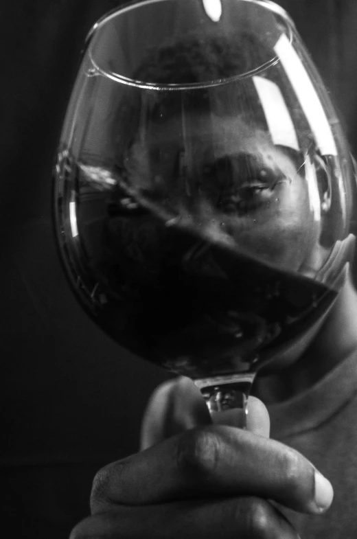 a close up of a person holding a glass of wine, dramatic portraiture of namenlos, black & white, ((portrait)), sfw