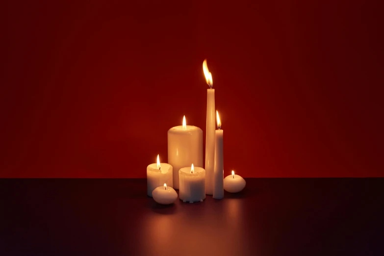 a group of white candles sitting on top of a table, an ambient occlusion render, inspired by Robert Mapplethorpe, unsplash, volumetric lighting. red, arson, clemens ascher, octane render - n 6