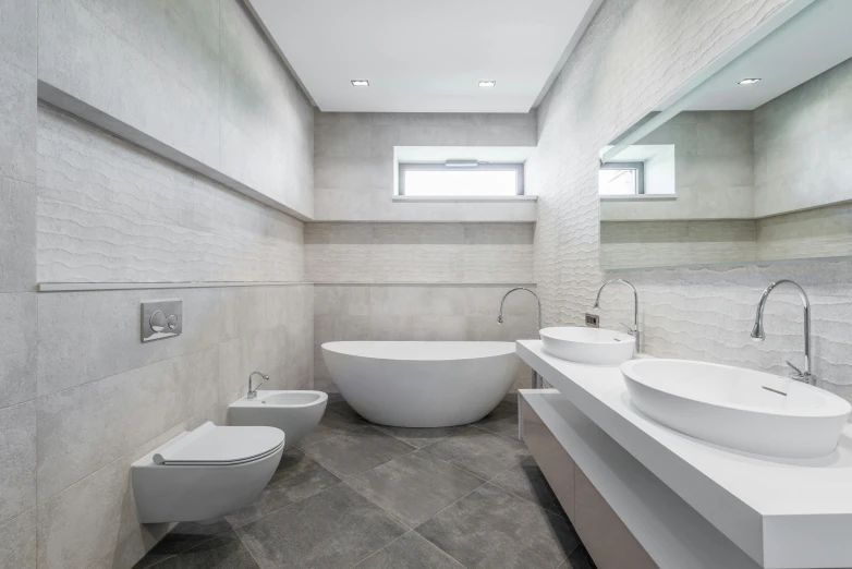 a bath room with a sink a toilet and a bath tub, inspired by Peter de Sève, pexels contest winner, minimalism, titanium white, solid grey, in a row, wide-angle view