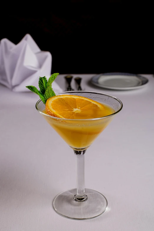 a close up of a drink in a glass on a table