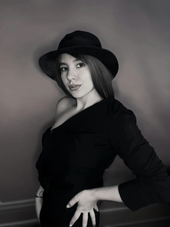 a black and white photo of a woman in a hat, by Alejandro Obregón, twitch streamer, professional profile picture, elegant posed, wearing black clothes