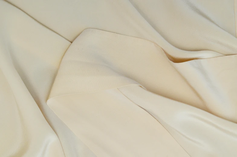 a close up of a sheet on a bed, by David Simpson, vanilla, dynamic closeup, silk robes, close up front view