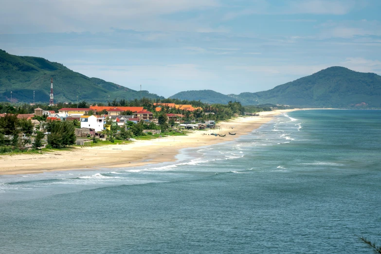 a large body of water next to a beach, pexels contest winner, vietnam, square, bl, high quality picture