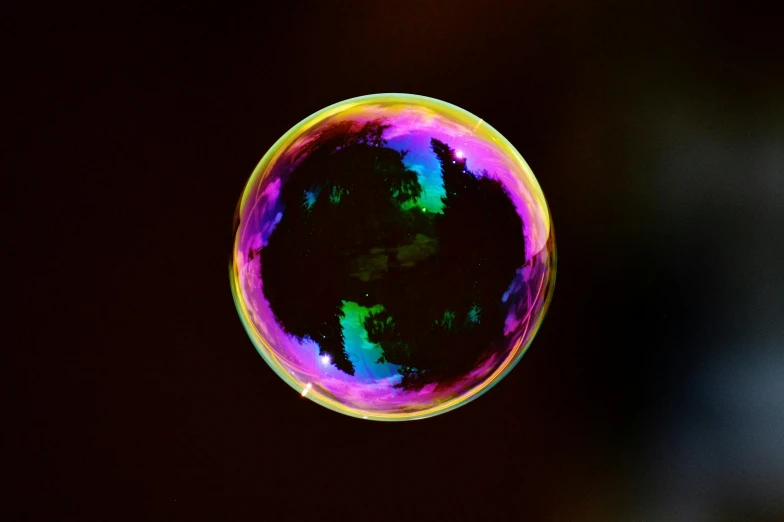 a colorful bubble floating in the air, inspired by Beeple, pexels, holography, ( ( dark skin ) ), simplistic, black, bubbly