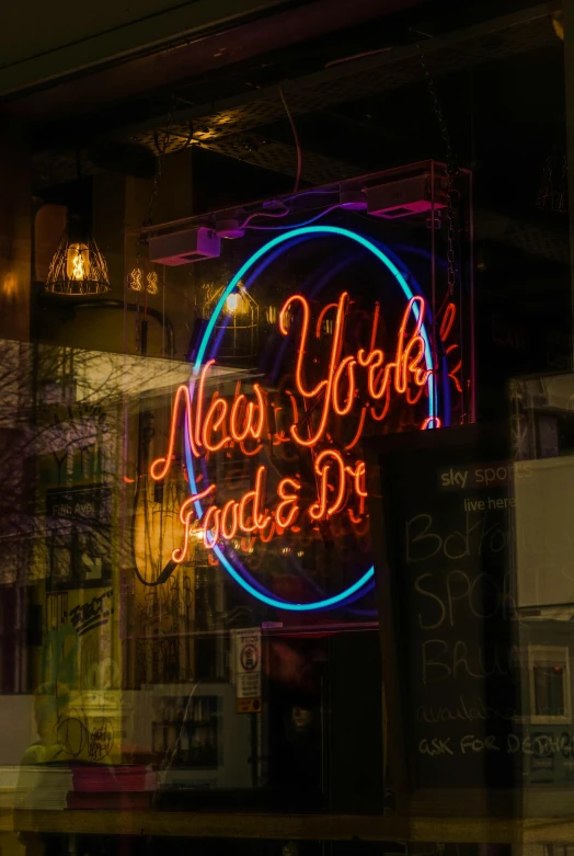 a neon sign in the window of a restaurant, by Nick Fudge, pexels contest winner, detalized new york background, shop front, local bar, neal adam
