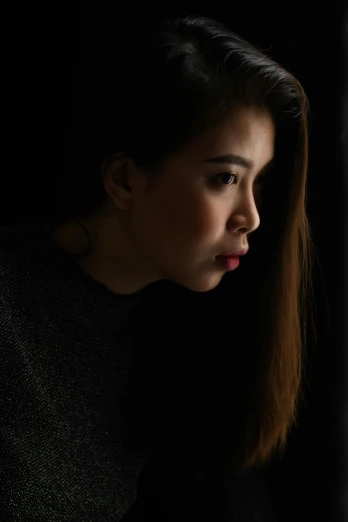 a woman looking out a window in a dark room, inspired by Yousuf Karsh, pexels contest winner, digital art, young asian girl, pouty lips, 🤤 girl portrait, with backlight