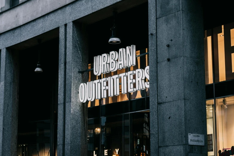 a group of people standing outside of a building, unsplash contest winner, urban clothing, sign, alana fletcher, ultradetailled