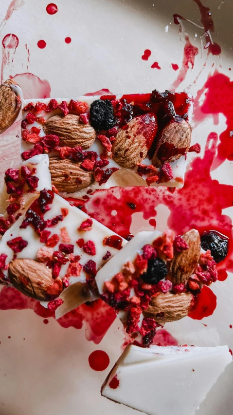 a close up of a plate of food on a table, an album cover, by Julia Pishtar, pexels, squashed berries, bark, 15081959 21121991 01012000 4k, festive