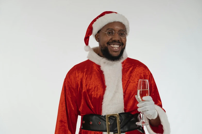 a man in a santa suit holding a glass of wine, an album cover, inspired by Ernest William Christmas, pexels, realism, black man, twitch emote, thick glasses, avatar image