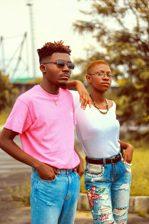 a man and a woman standing next to each other, an album cover, by Lily Delissa Joseph, pexels, wearing casual clothing, peach and goma style, teenager, high quality picture