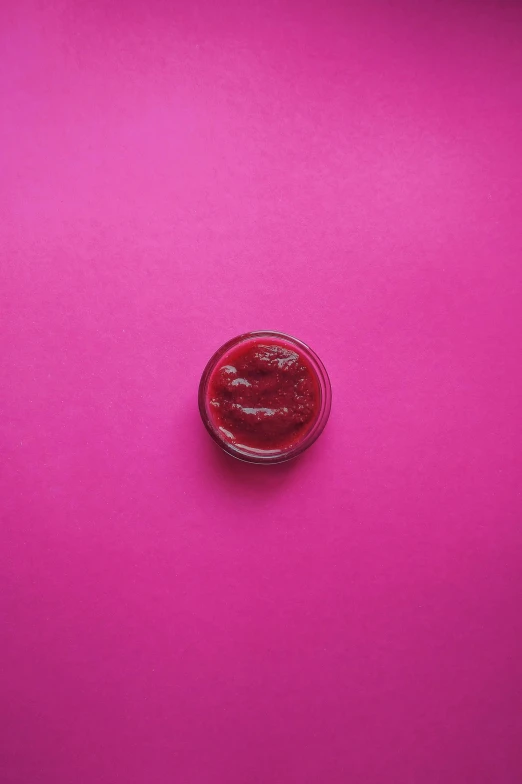a bowl of ketchup on a pink background, by Jacob Toorenvliet, pexels contest winner, visual art, rubber stamp, view from above, jelly, embossed paint