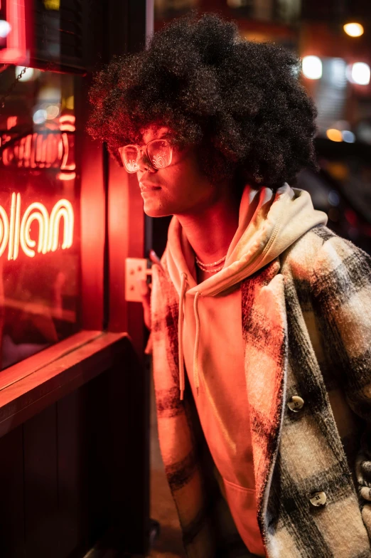 a woman standing in front of a neon sign, trending on unsplash, realism, black teenage boy, man with glasses, in a pub, imaan hammam
