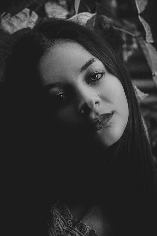 a black and white photo of a woman with long hair, a black and white photo, inspired by Elsa Bleda, unsplash, :: madison beer, gothic face, miranda cosgrove, lowres